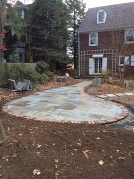 Full Color PA Bluestone patio with reclaimed brick border.