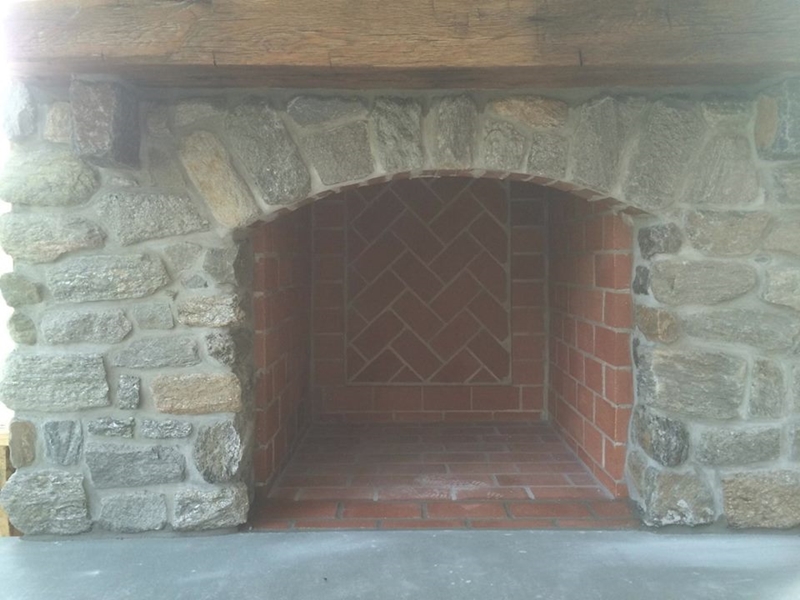 Mica Veneer Fireplace with a Custom Fire Brick Fire